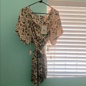 Spell Journey Romper with tags.